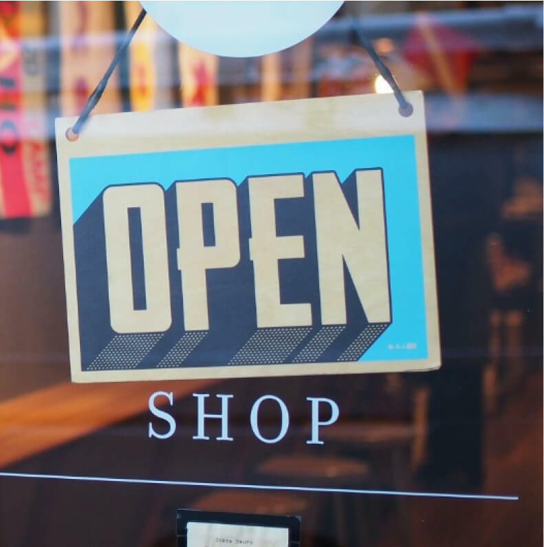 Open Sign on the front door of a Plato's Closet Store